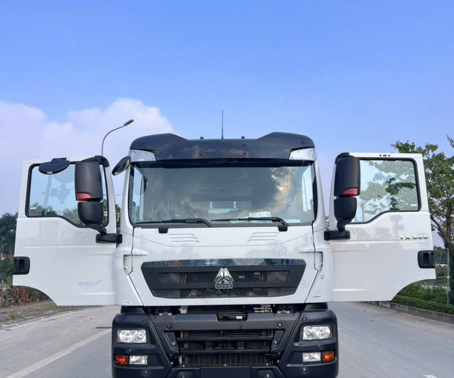XE BỒN TRỘN BÊ TÔNG 14 KHỐI HOWO TX350 4 CHÂN